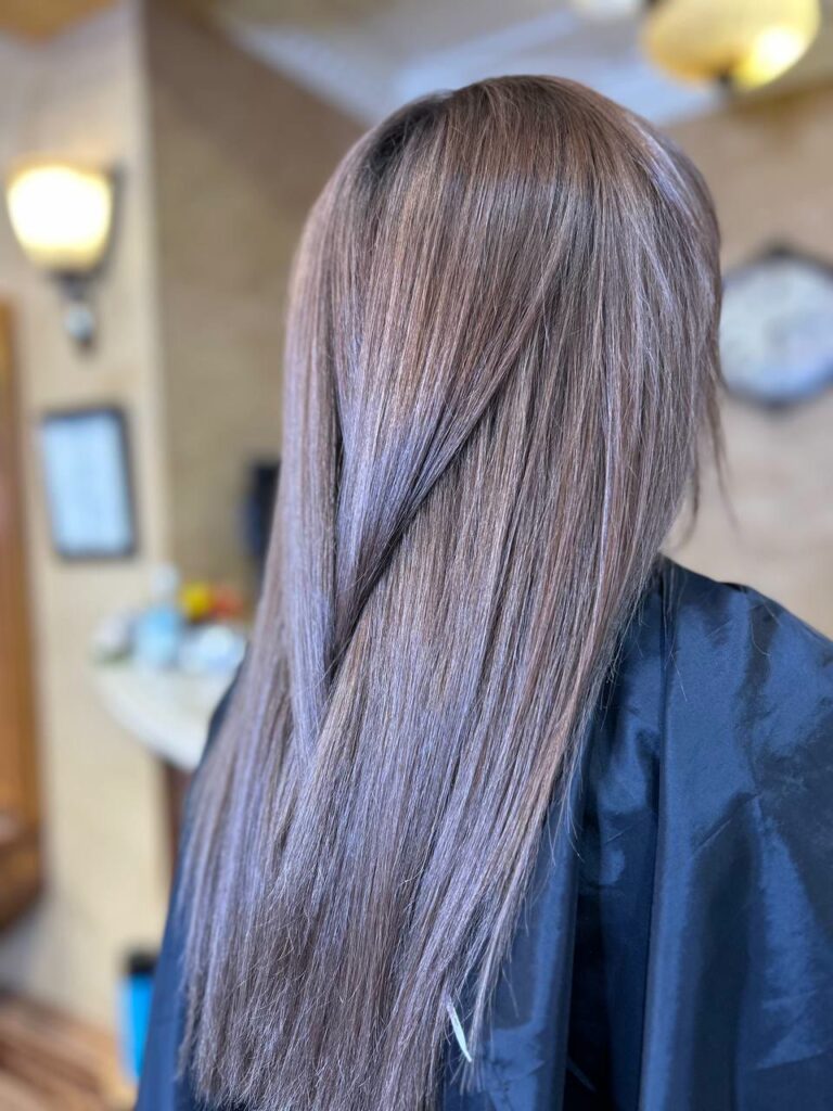Ash brown balayage on long hair