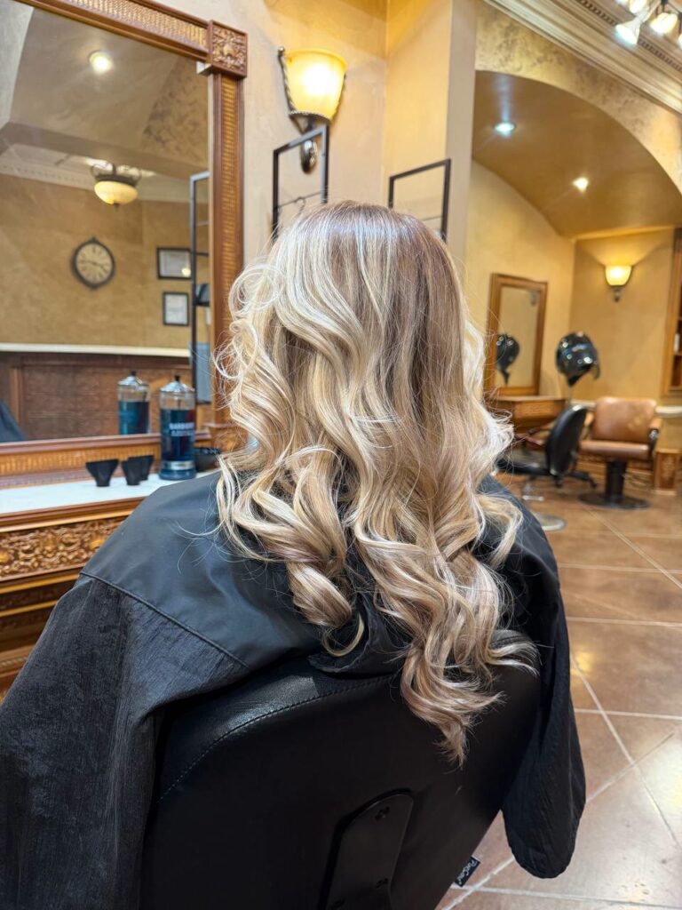 Blonde balayage with soft curls