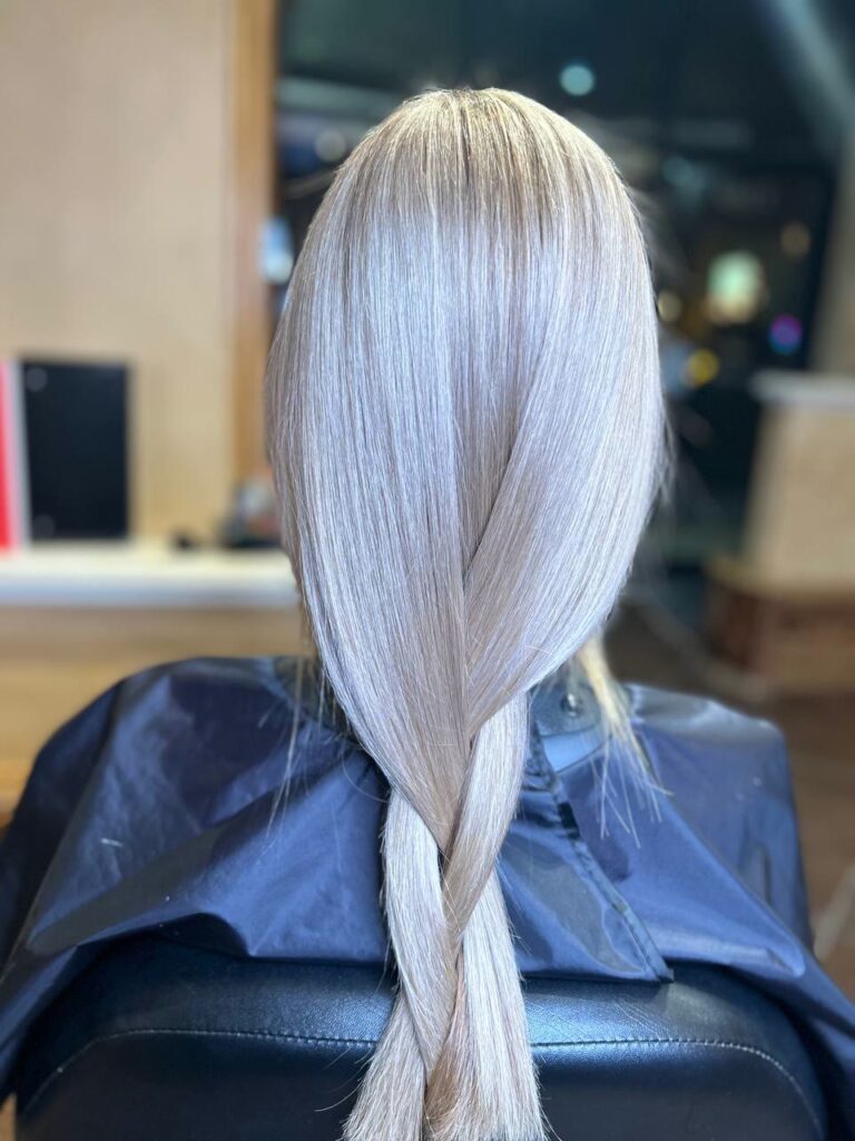 Icy blonde hair in a braid