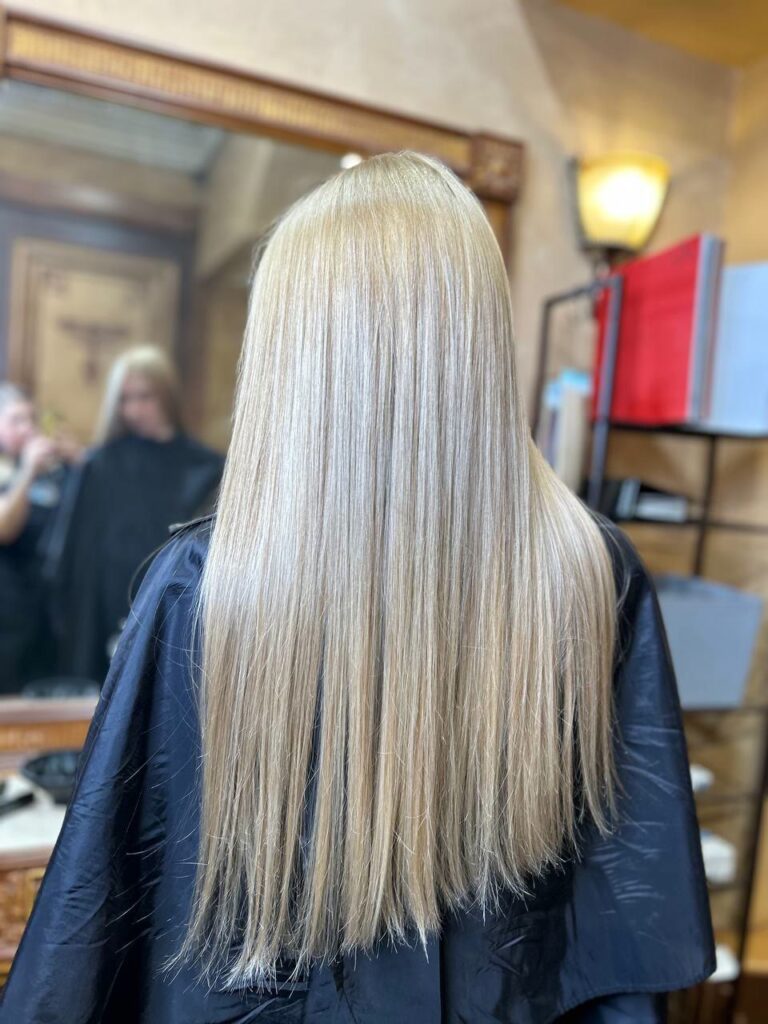 Platinum blonde long hair after lightening and toner